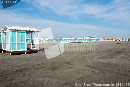 Image of Beautiful black sandy beach with beach houses