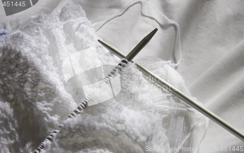 Image of white knitting 