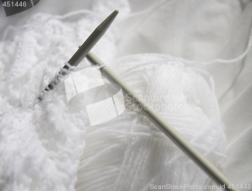 Image of white knitting 