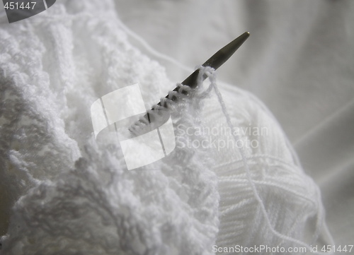 Image of white knitting 