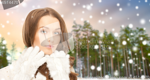 Image of close up of beautiful woman over winter forest