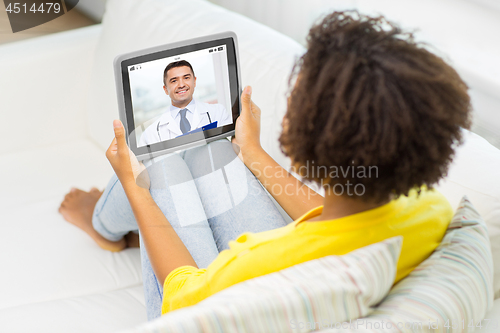 Image of patient having video chat with doctor on tablet pc