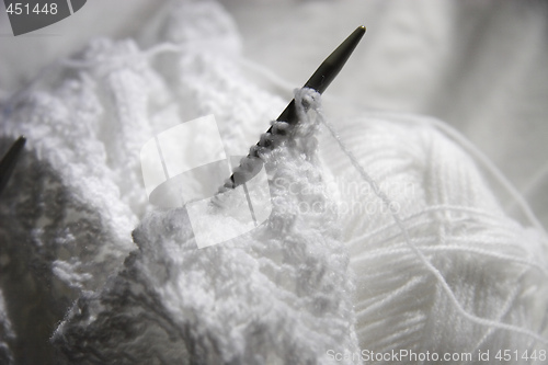 Image of white knitting 