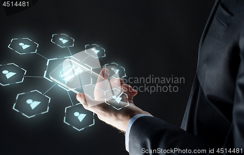 Image of businessman with smartphone and car sharing icons