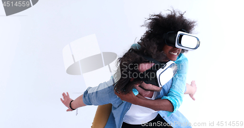 Image of multiethnic couple getting experience using VR headset glasses