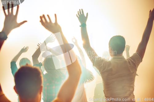 Image of Nightlife and disco concept. Young people are dancing in club.