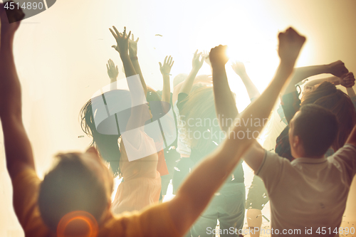 Image of Nightlife and disco concept. Young people are dancing in club.