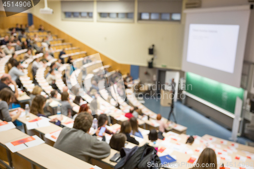 Image of Defocused image of audience at the conference hall during academic lecture.