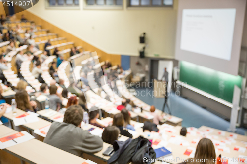 Image of Defocused image of audience at the conference hall during academic lecture.