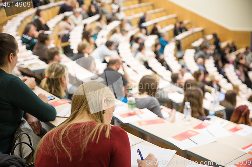 Image of Participants attending regular trade union assembly session at lecture room.