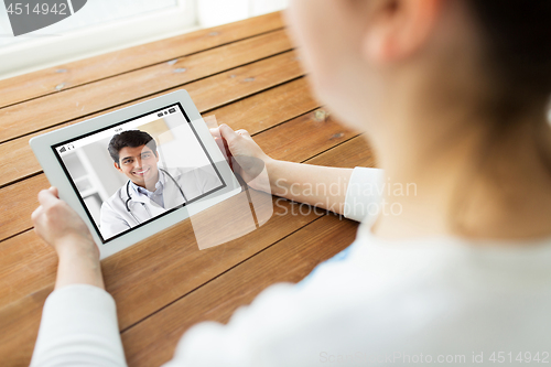 Image of patient having video chat with doctor on tablet pc