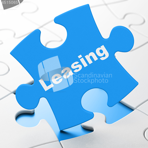 Image of Finance concept: Leasing on puzzle background