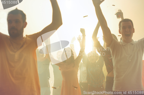 Image of Nightlife and disco concept. Young people are dancing in club.