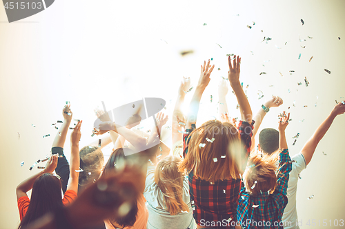 Image of Nightlife and disco concept. Young people are dancing in club.