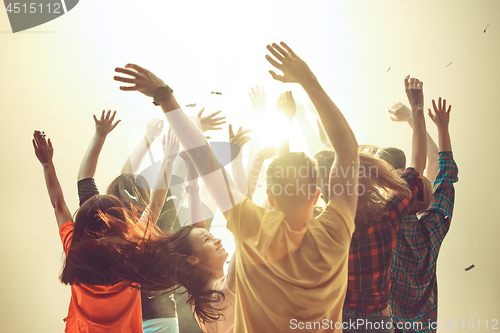 Image of Nightlife and disco concept. Young people are dancing in club.