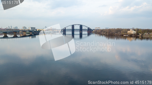 Image of unfinished Podolsk-Voskresensky bridge connecting the Truhanov island and the Troyeschina area across the Dnipro River in Kiev