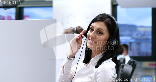 Image of female call centre operator doing her job