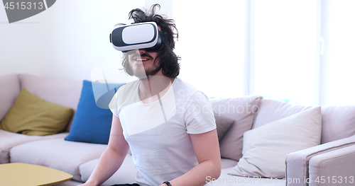 Image of man using VR-headset glasses of virtual reality