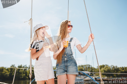 Image of The children on board of sea yacht