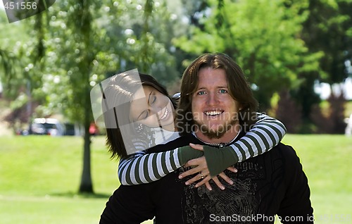 Image of Young couple looking at the camera 