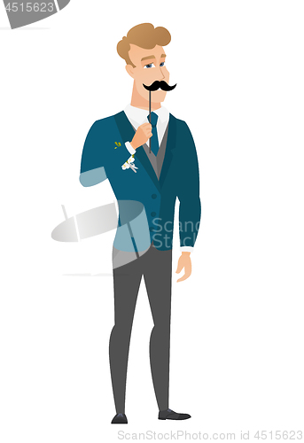 Image of Cheerful groom with a fake mustache.