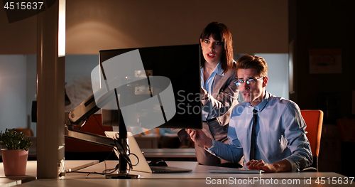 Image of young designers in the night office