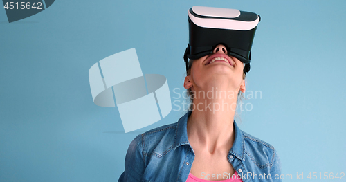 Image of woman using VR headset glasses of virtual reality
