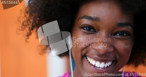 Image of portrait of young afro american woman in gym
