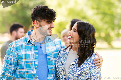 Image of happy couple in summer park