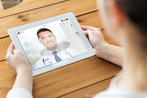 Image of patient having video chat with doctor on tablet pc