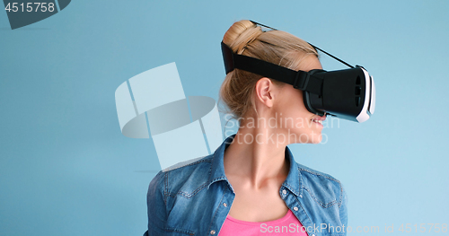 Image of woman using VR headset glasses of virtual reality