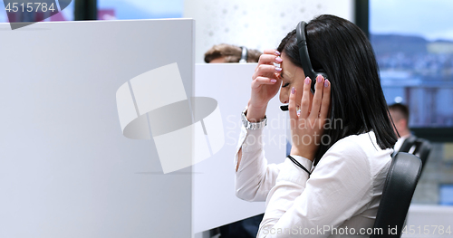 Image of female call centre operator doing her job