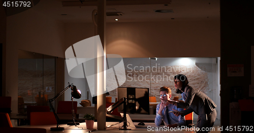 Image of young designers in the night office