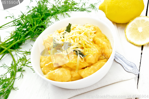 Image of Gnocchi pumpkin in bowl on light board