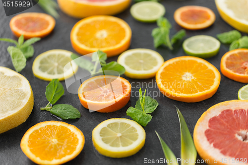 Image of close up of grapefruit, orange, pomelo and lime