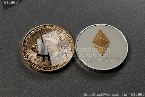 Image of Gold and silver coins of crypto-currency on a dark background. Business concept