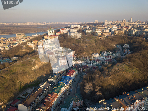 Image of A view from the height of Vozdvizhenka with new residential houses, Bald mountain and St. Andrew\'s Church in the Kyiv city