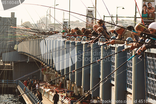 Image of Fishermen and tourists are on the Galata Bridge