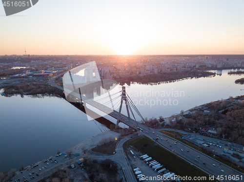 Image of Kiev, Ukraine: 7 April, 2018 - City landscape from a bird\'s-eye view overlooking North Bridge (Moscow Bridge) across Dnieper River, photo from drone