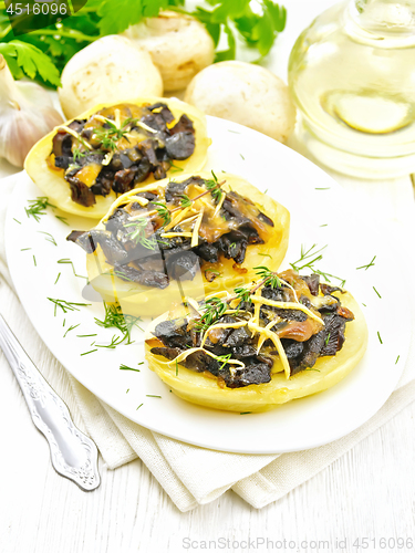 Image of Potatoes stuffed with mushrooms on table