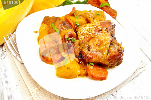 Image of Chicken roast with pumpkin and carrots on board