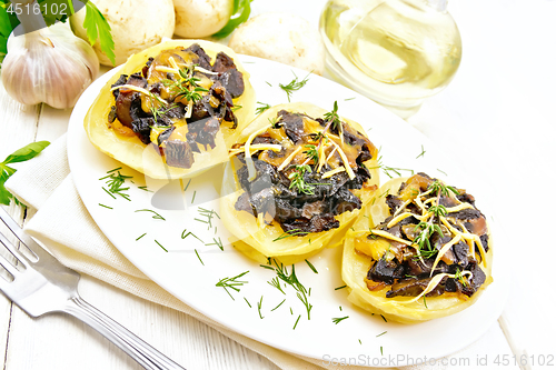 Image of Potatoes stuffed with mushrooms on board