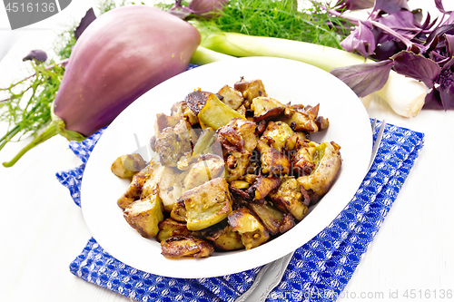 Image of Eggplant fried on blue napkin