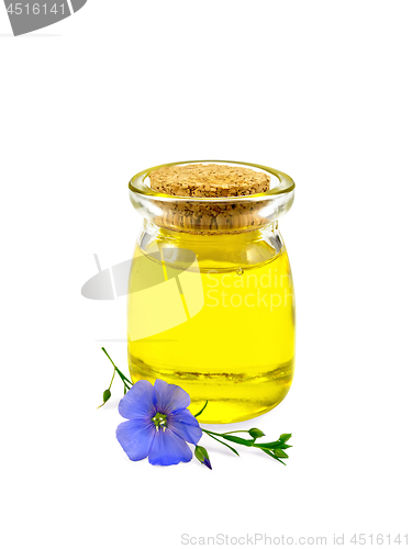 Image of Oil linenseed in jar with flower