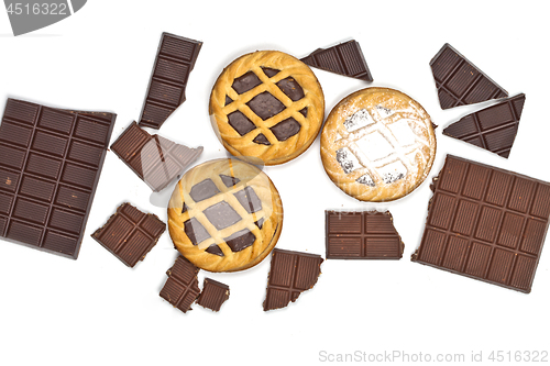 Image of Tarts with chocolate cream and cracked chocolate pieces isolated