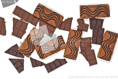 Image of Cake bars filled with cream and cracked chocolate pieces isolate