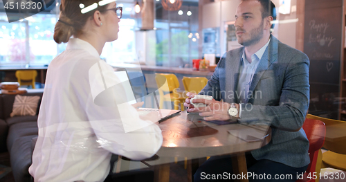 Image of Startup Business Team At A Meeting at modern office building