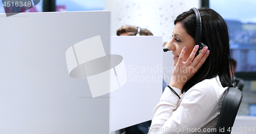 Image of female call centre operator doing her job