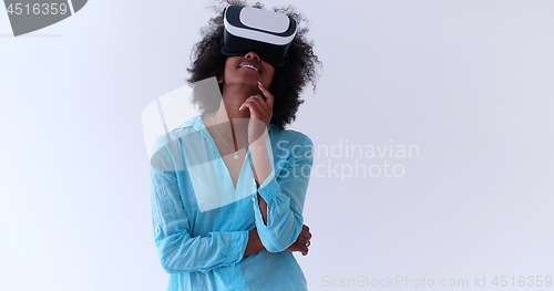 Image of black girl using VR headset glasses of virtual reality