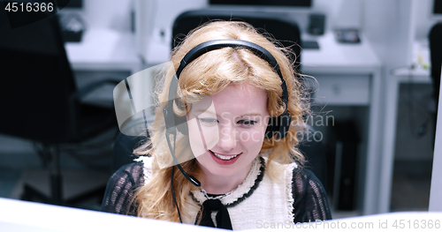 Image of female call centre operator doing her job